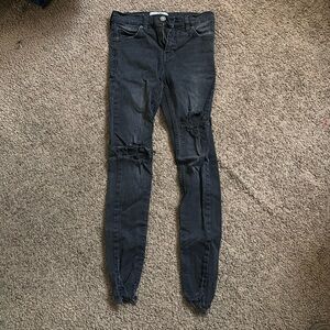 Free people distressed skinny jeans